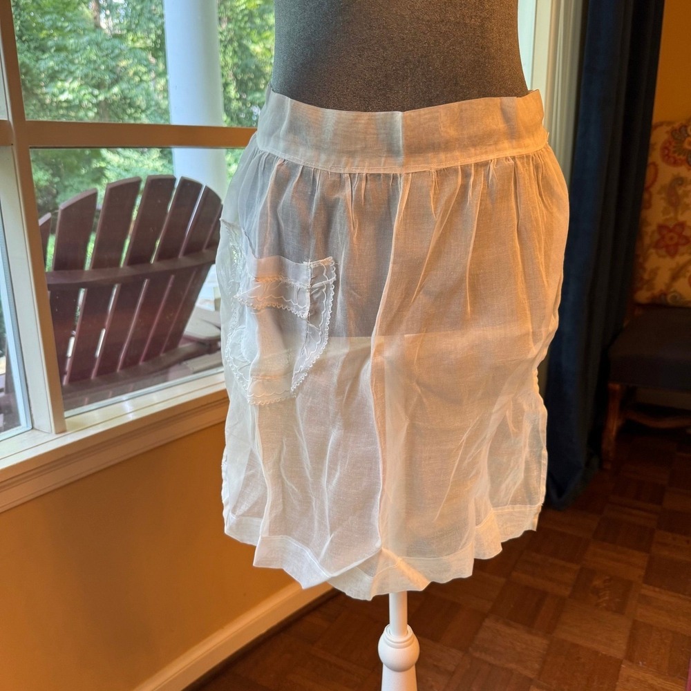 Vintage sheer chiffon or organdy half apron with lace trim and a single pocket